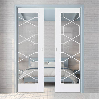 Image: Orly Double Evokit Pocket Doors - Clear Glass - White Primed