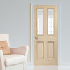 Oak interior door with elegant bevelled glass