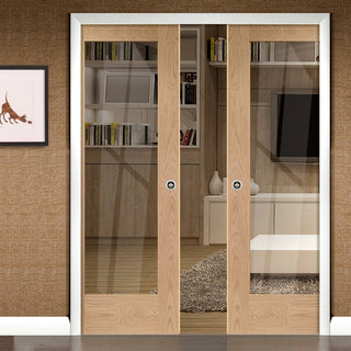 Image: Pattern 10 Oak Double Evokit Pocket Doors - Clear Glass - Prefinished