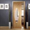 Pesaro Oak Single Evokit Pocket Door - Clear Glass - Prefinished
