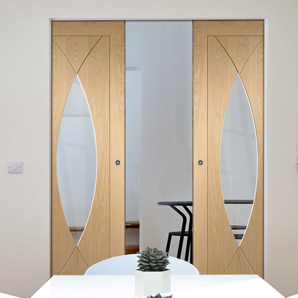 Pesaro Oak Absolute Evokit Double Pocket Door - Clear Glass - Prefinished