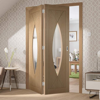 Image: Bespoke Thrufold Pesaro Oak Glazed Folding 2+0 Door
