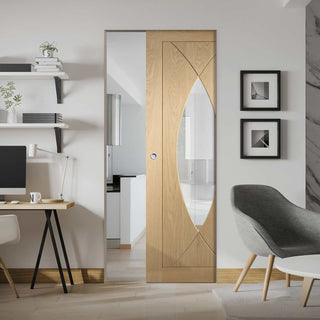 Image: Pesaro Oak Absolute Evokit Pocket Door - Clear Glass - Prefinished