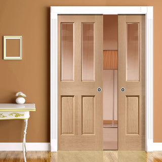 Image: Malton Oak Double Evokit Pocket Doors - No Raised Moulding - Bevelled Clear Glass - Prefinished