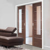 Portici Walnut Flush Double Evokit Pocket Doors - Aluminium Inlay & Clear Glass - Prefinished