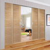 Portici Oak Veneer Staffetta Quad Telescopic Pocket Doors - Aluminium Inlay - Prefinished