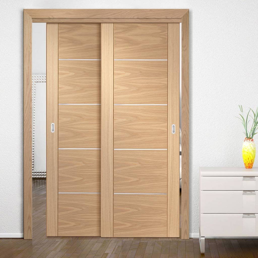Two Sliding Doors and Frame Kit - Portici Oak Flush Door - Aluminium Inlay - Prefinished
