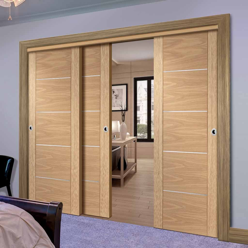 Three Sliding Doors and Frame Kit - Portici Oak Flush Door - Aluminium Inlay - Prefinished