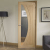 Glazed bespoke oak veneer interior door design