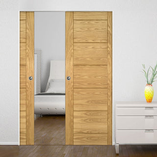 Image: Seville Oak Panel Absolute Evokit Double Pocket Doors - Prefinished
