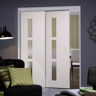 Image: Sierra Blanco Staffetta Twin Telescopic Pocket Doors - Frosted Glass - White Painted