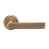 Serozzetta Edge SZM210 Lever Latch Handles on Round Rose - Antique Brass