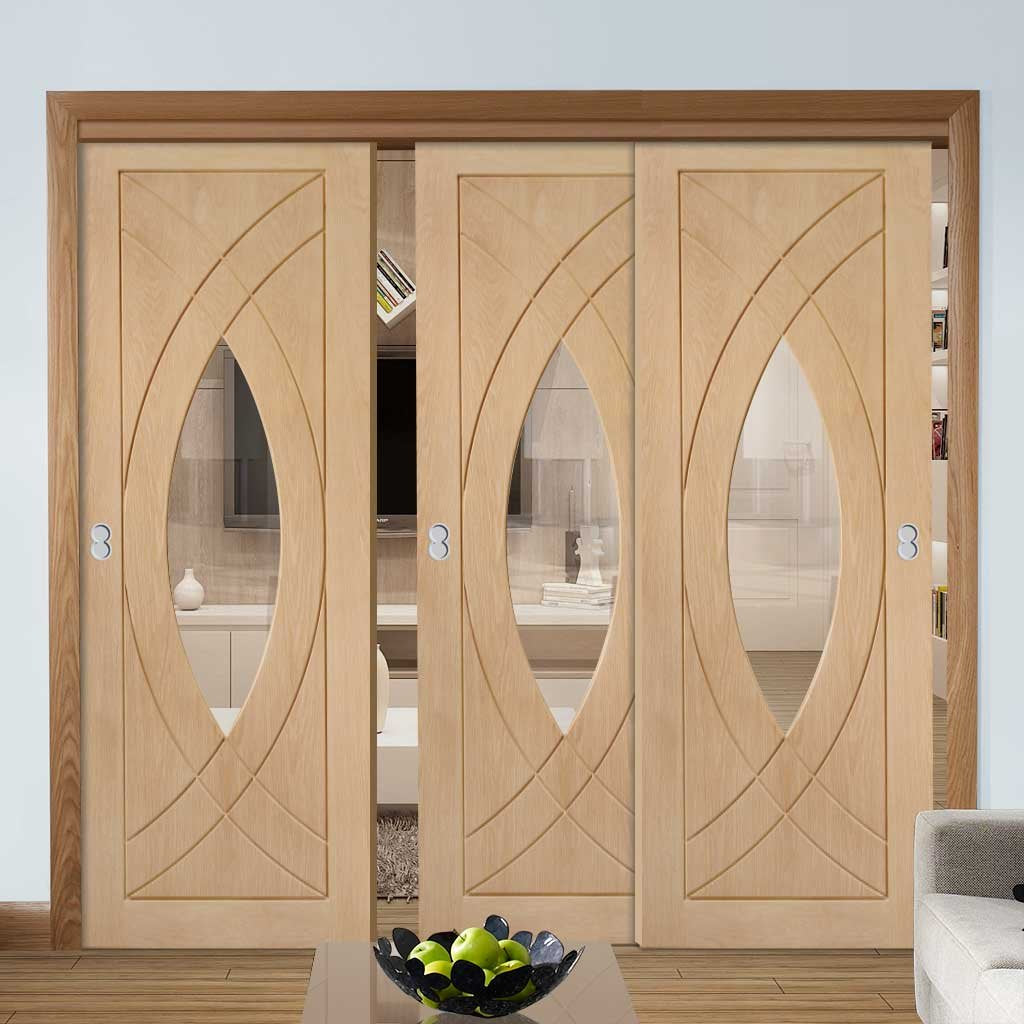 Bespoke Thruslide Treviso Oak Glazed - 3 Sliding Doors and Frame Kit - Prefinished