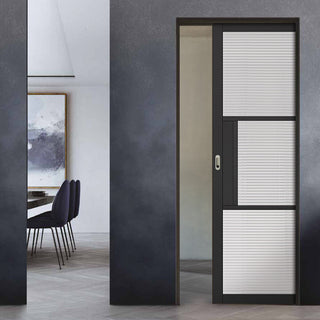 Image: Tribeca 3 Pane Black Primed Single Evokit Pocket Door - Clear Reeded Glass