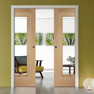 Image: Varese Oak Flush Double Evokit Pocket Doors - Clear Glass - Aluminium Inlay - Prefinished